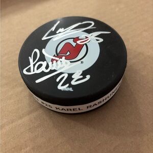 Autographed New Jersey Devils Hockey Puck